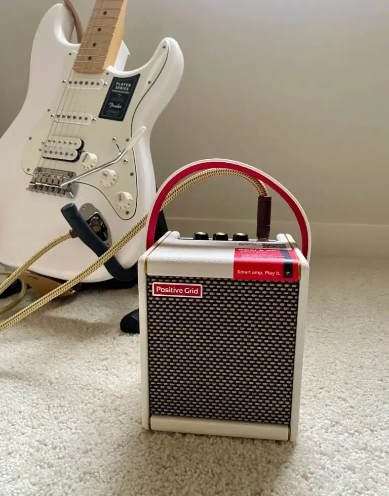 Positive Grid Spark mini amp with a white Stratocaster