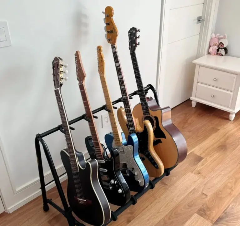 Multi guitar stand holding several guitars