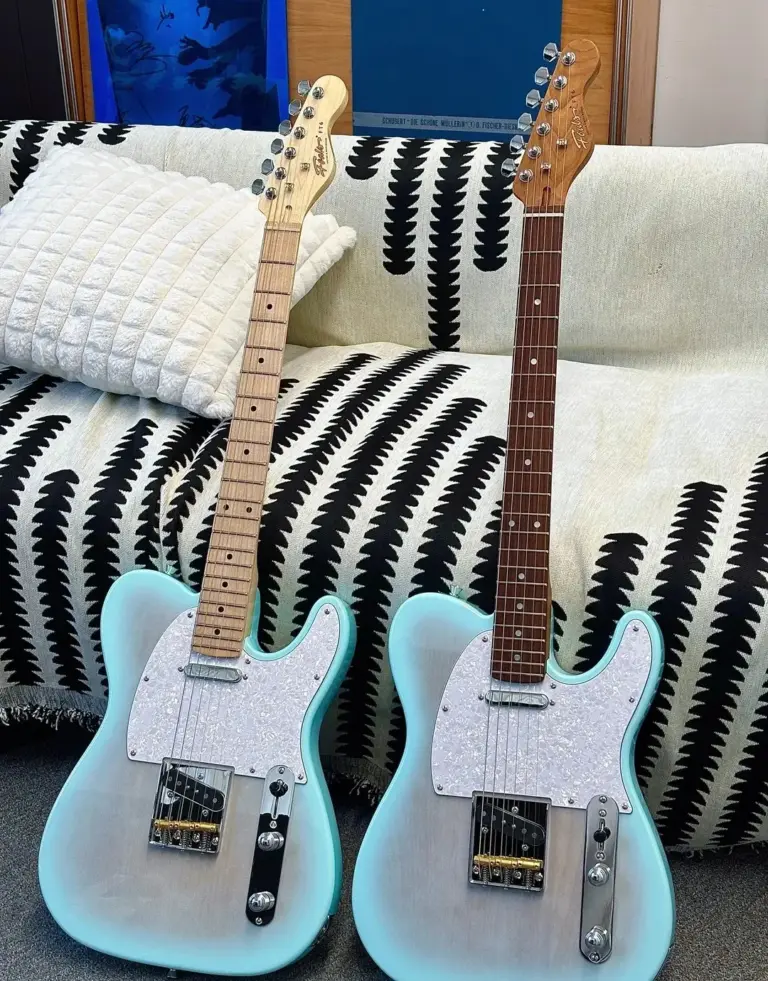 Two sonic blue Telecasters side by side