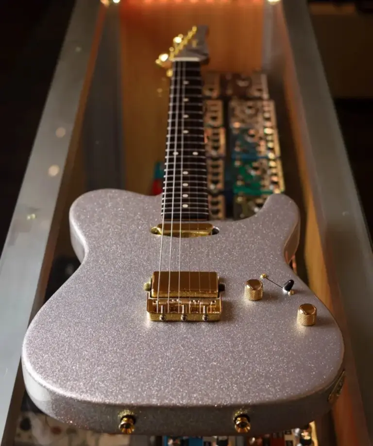Electric guitar with a silver sparkle finish